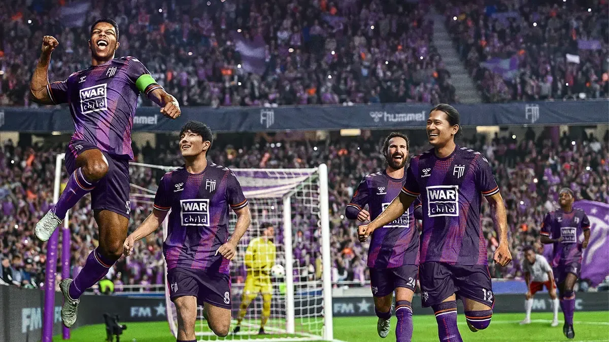 Classic scene of player celebrating after scoring a goal in Football Manager franchise.