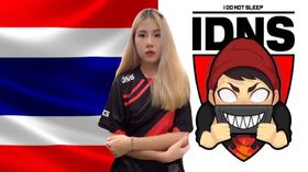 IDNS Ramella standing in front of team logo