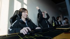 Team Spirit sitting in a line at their computers