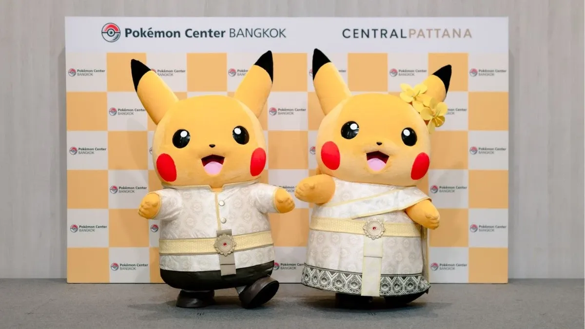 Two PIkachu mascots wearing traditional Thai clothing