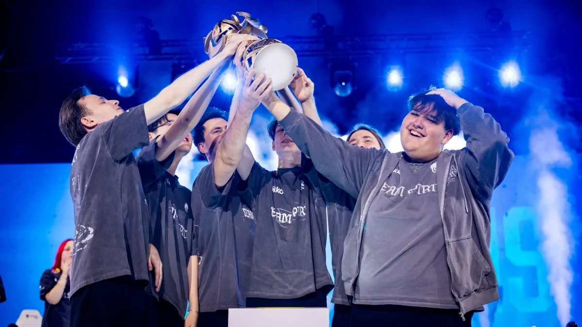 Team Spirit raising the MLBB Mid Season Cup 2026 trophy.
