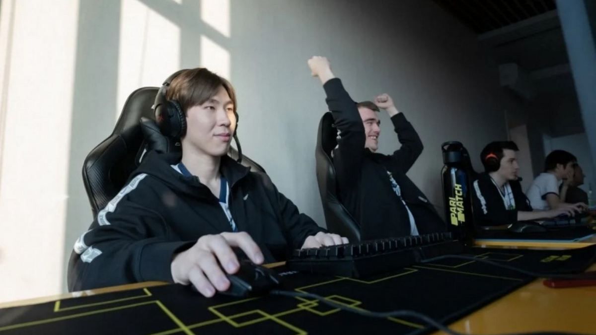 Team Spirit sitting in a line at their computers