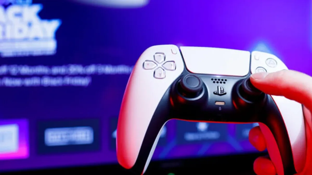 PlayStation Controller in front of a TV screen with the PlayStation Store.