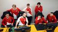 AS Monaco Gambit Dota 2 team sitting at their computers
