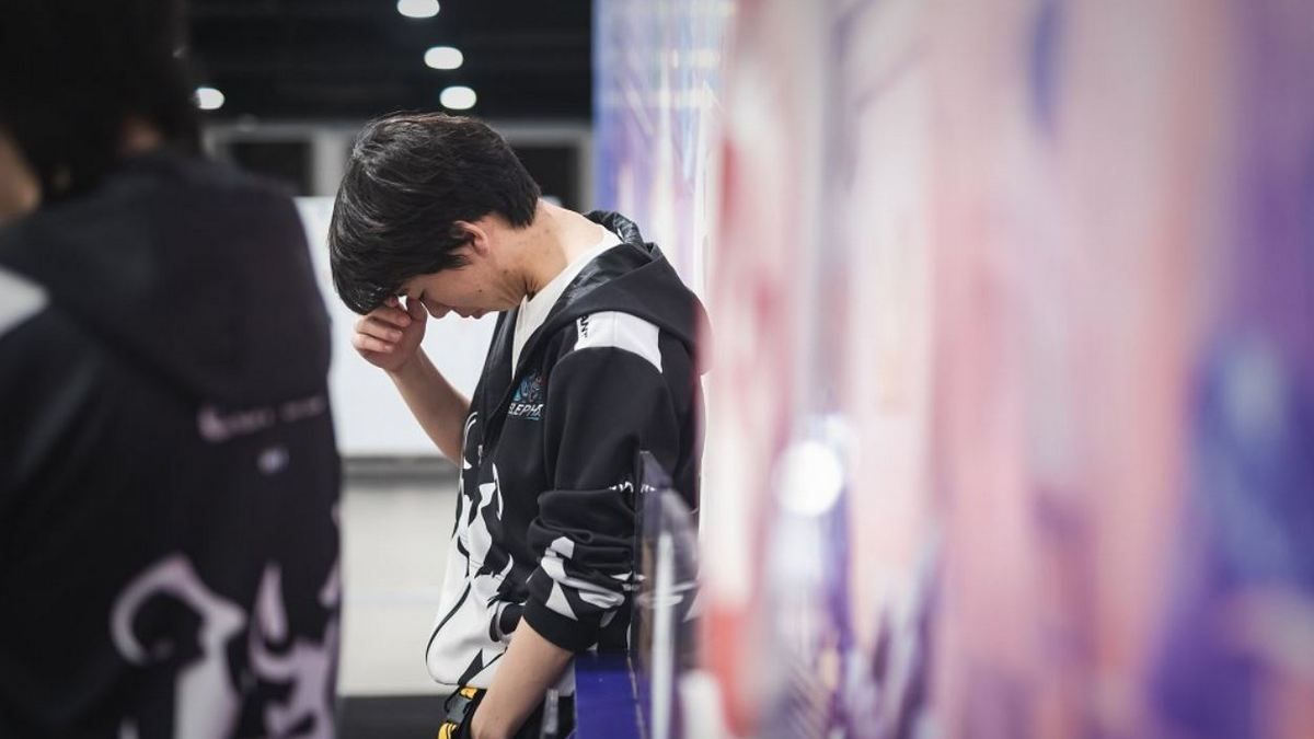 RedPanda looking down in disappointment