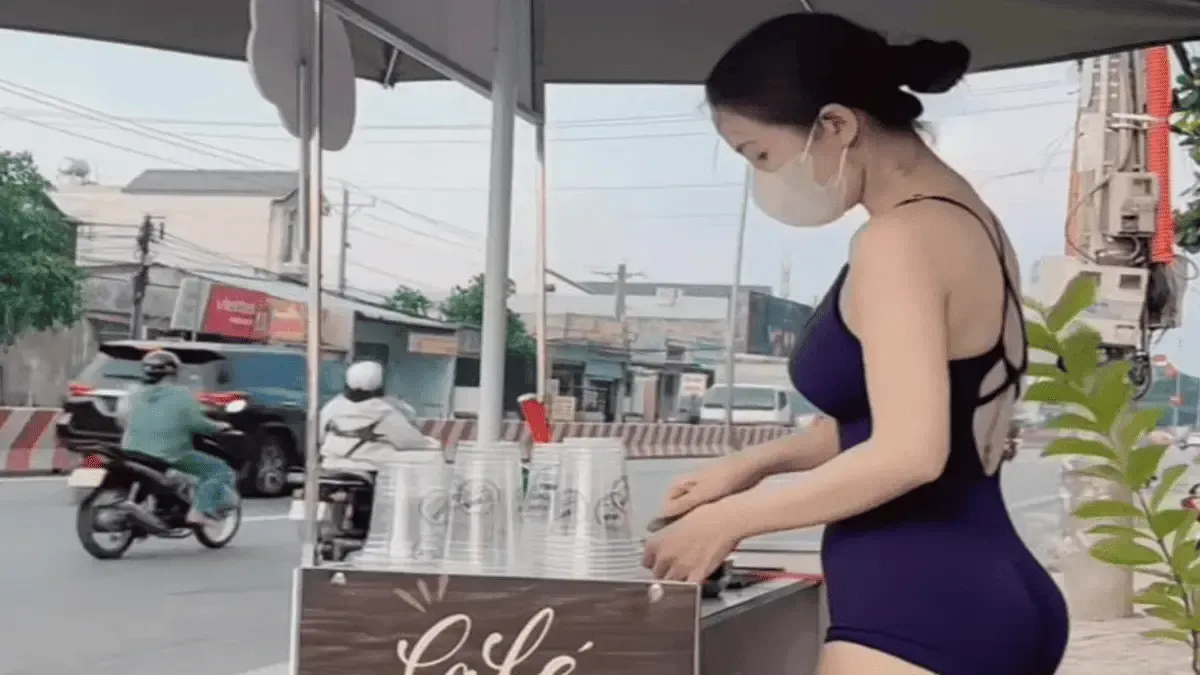 "Hot girl bán cà phê" diện đồ gym gây bão mạng xã hội