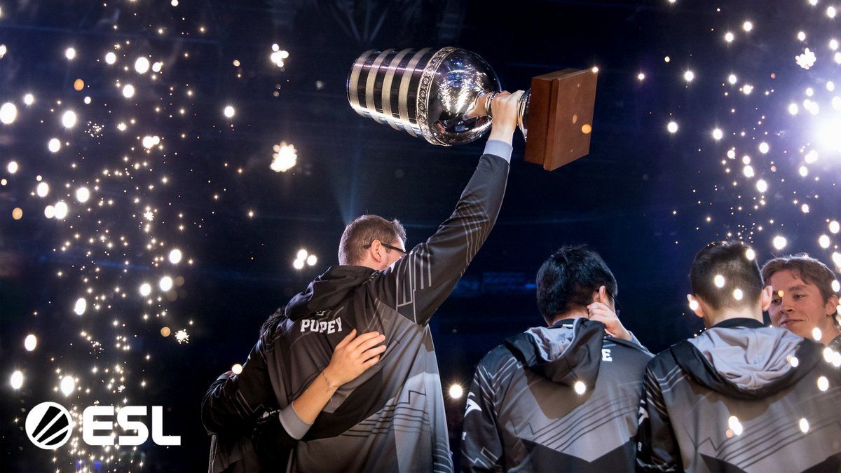 Team Secret lifting the trophy at ESL One 