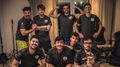 SG e-sports full Dota team posing after Ti10 qualifiers