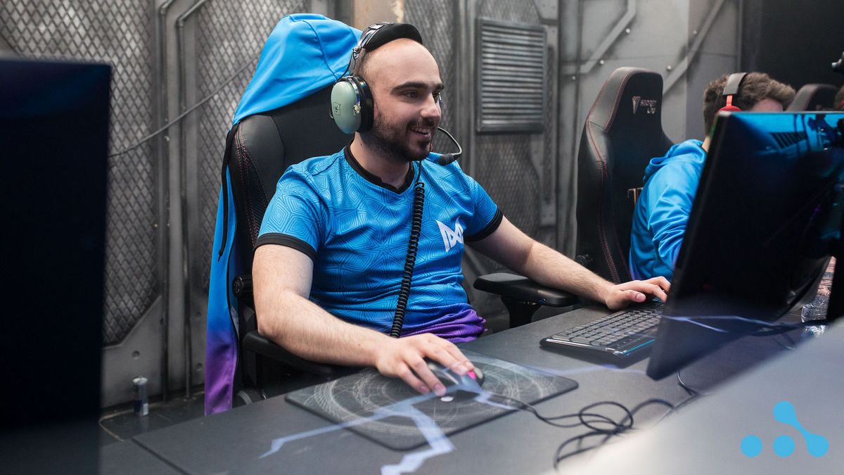 KuroKy of Team Nigma looking happy while playing Dota 2