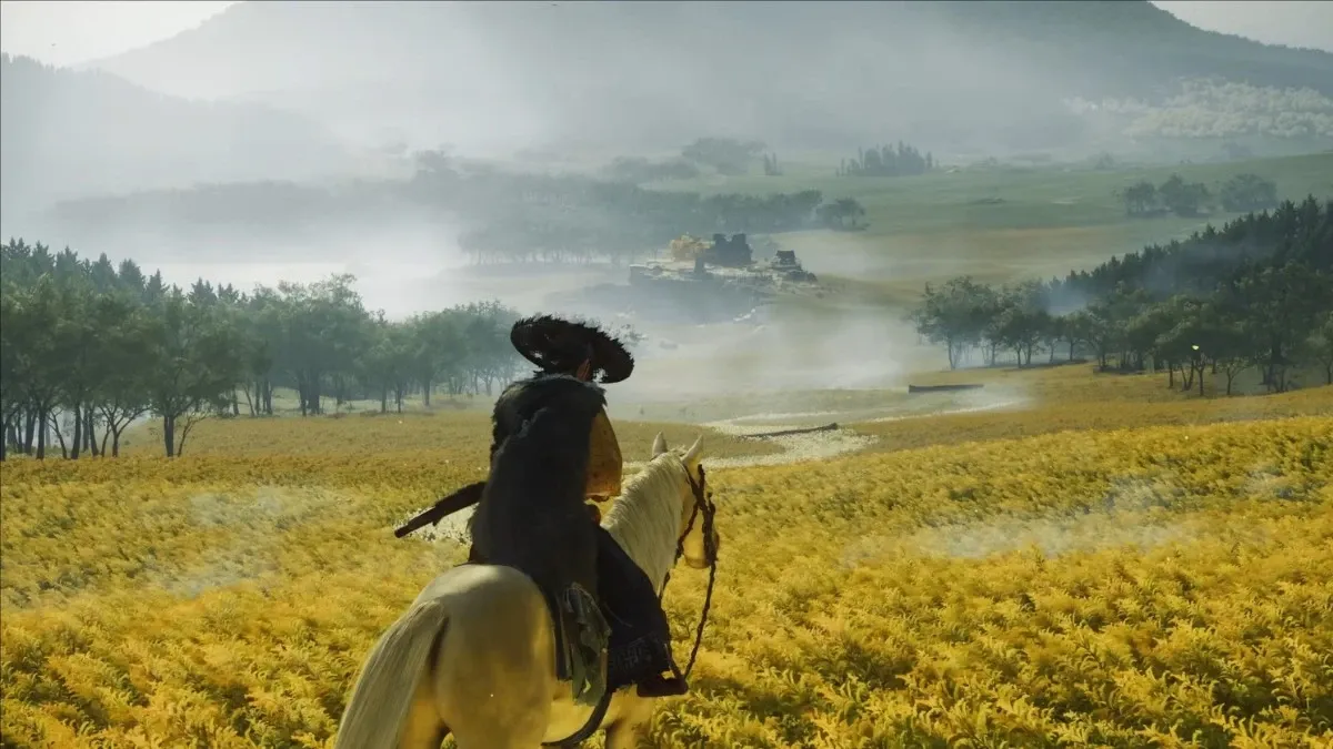 Ghost of Yotei screen capture of Atsu riding on a horse and looking at the scenery ahead